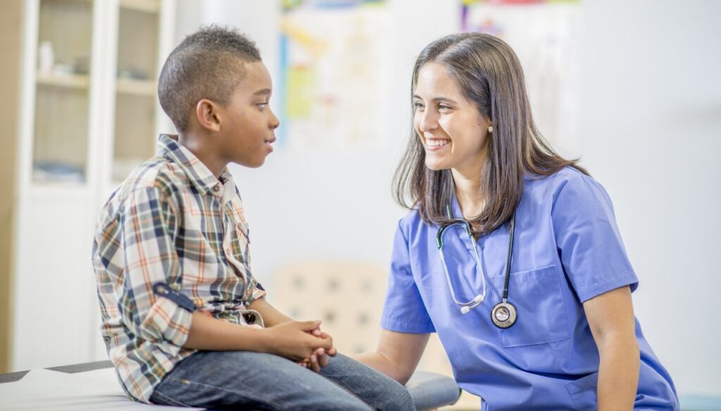 doctor with juvenile patient, discussing pediatric nutrition